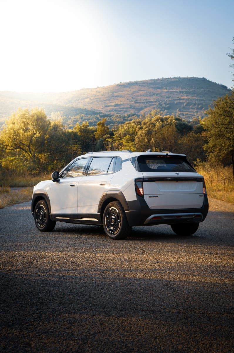 Dongfeng 06 — rear three-quarter view at sunset